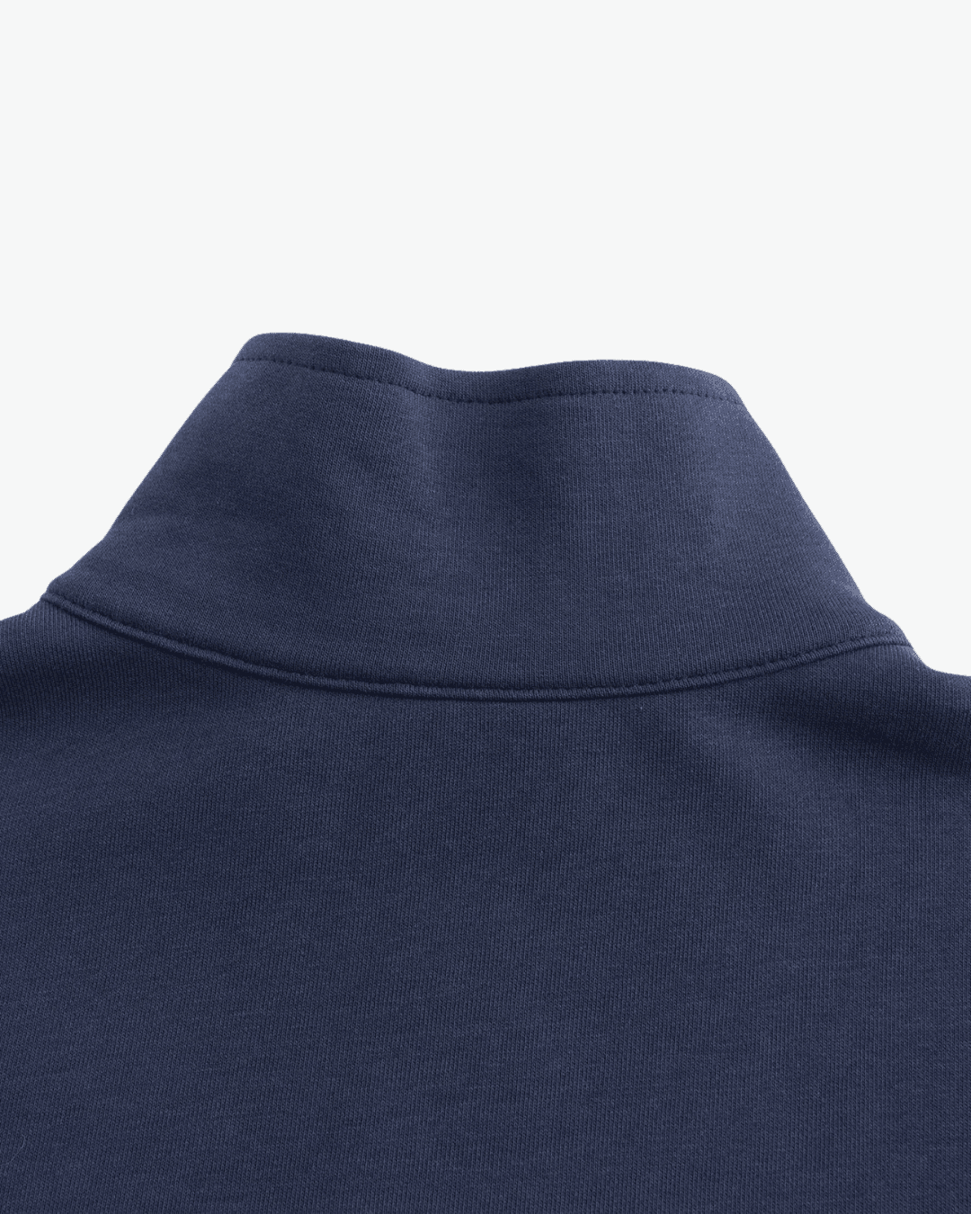 Close-up of a navy blue garment with a collar on a light gray background