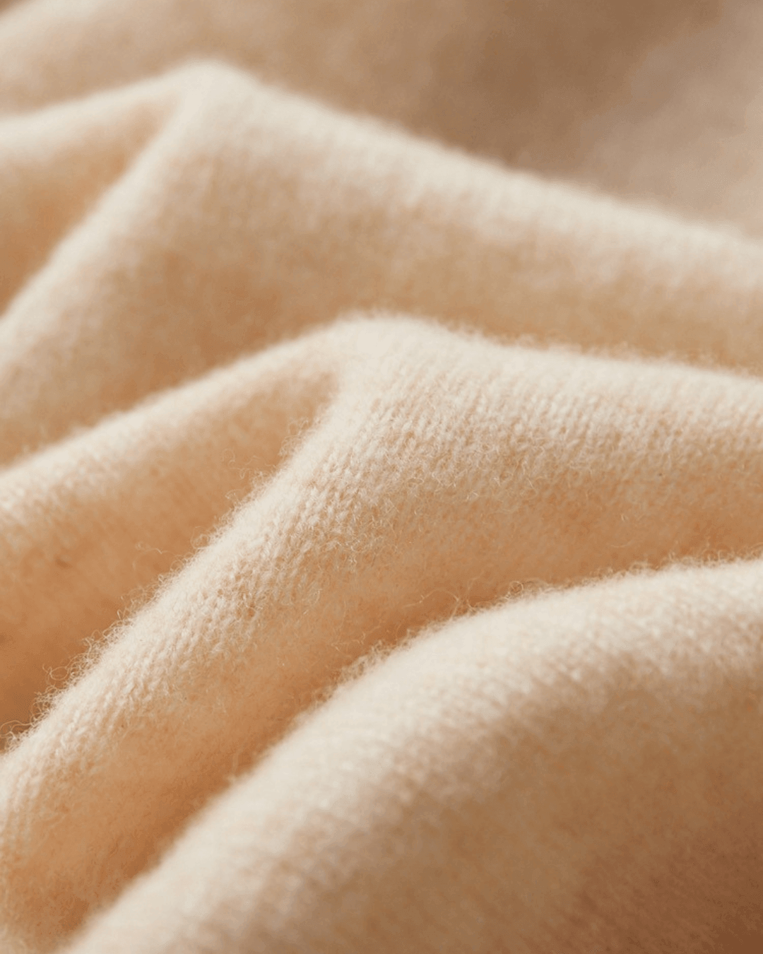 Close-up of beige fabric texture